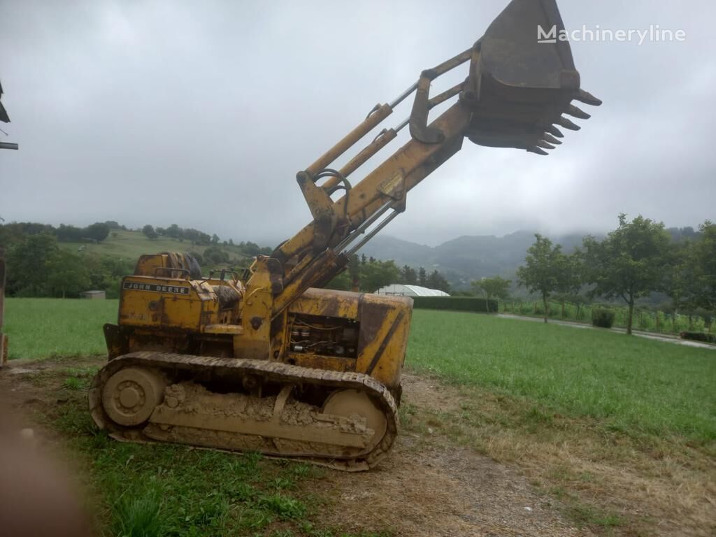 John Deere cargadora de cadenas